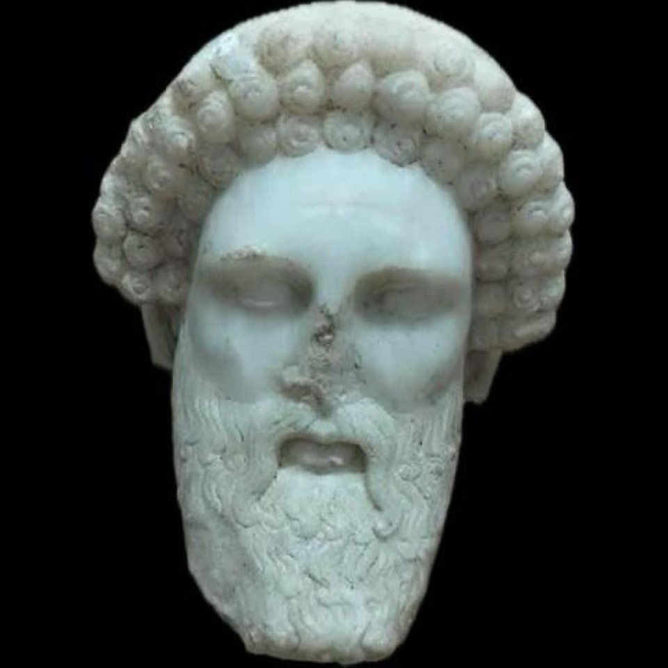 14.Μαρμάρινη γενειοφόρος κεφαλή Ερμή του τύπου του Ερμή Προπύλαιου. Ύψος 12,7 εκ. 2ος-1ος αι. π.Χ.