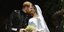 Ο πρίγκιπας Χάρι και η Μέγκαν Μαρκλ στον γάμο /Φωτογραφία: AP