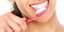 Κορωνοϊός γυναίκα με οδοντόβουρτσα