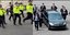 Συγκρίσεις με τον Κιμ Γιονγκ Ουν προκάλεσαν οι εικόνες αστυνομικοί που συνόδευαν πεζή τον Ρίσι Σούνακ στο Λονδίνο
