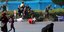 Πλήθος τρέχει πανικόβλητο να σωθεί καθώς πέφτουν οι σφαίρες στη διάρκεια της παρέλασης στο Αχβάζ (Φωτογραφία: ΑΡ) 
