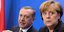 Η Γερμανίδα καγκελάριος Ανγκελα Μέρκελ και ο Τούρκος Πρόεδρος Ρετζέπ Ταγίπ Ερντογάν/ Φωτογραφία: Axel Schmidt/ AP 