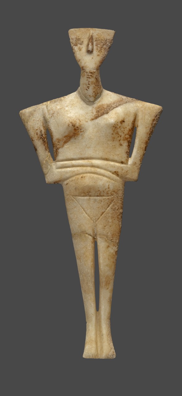 Βιολόσχημο μαρμάρινο ειδώλιο από το νεκροταφείο στα Γλυφά Πάρου (3200-2800 π.Χ.). © ΕΑΜ/ΤΑΠ. Φωτ. Σ. Μαυρομμάτης. 