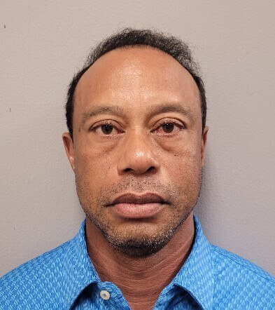This image has an empty alt attribute; its file name is AP%20Tiger%20Woods%20mugshot%20syllipsi.jpg
