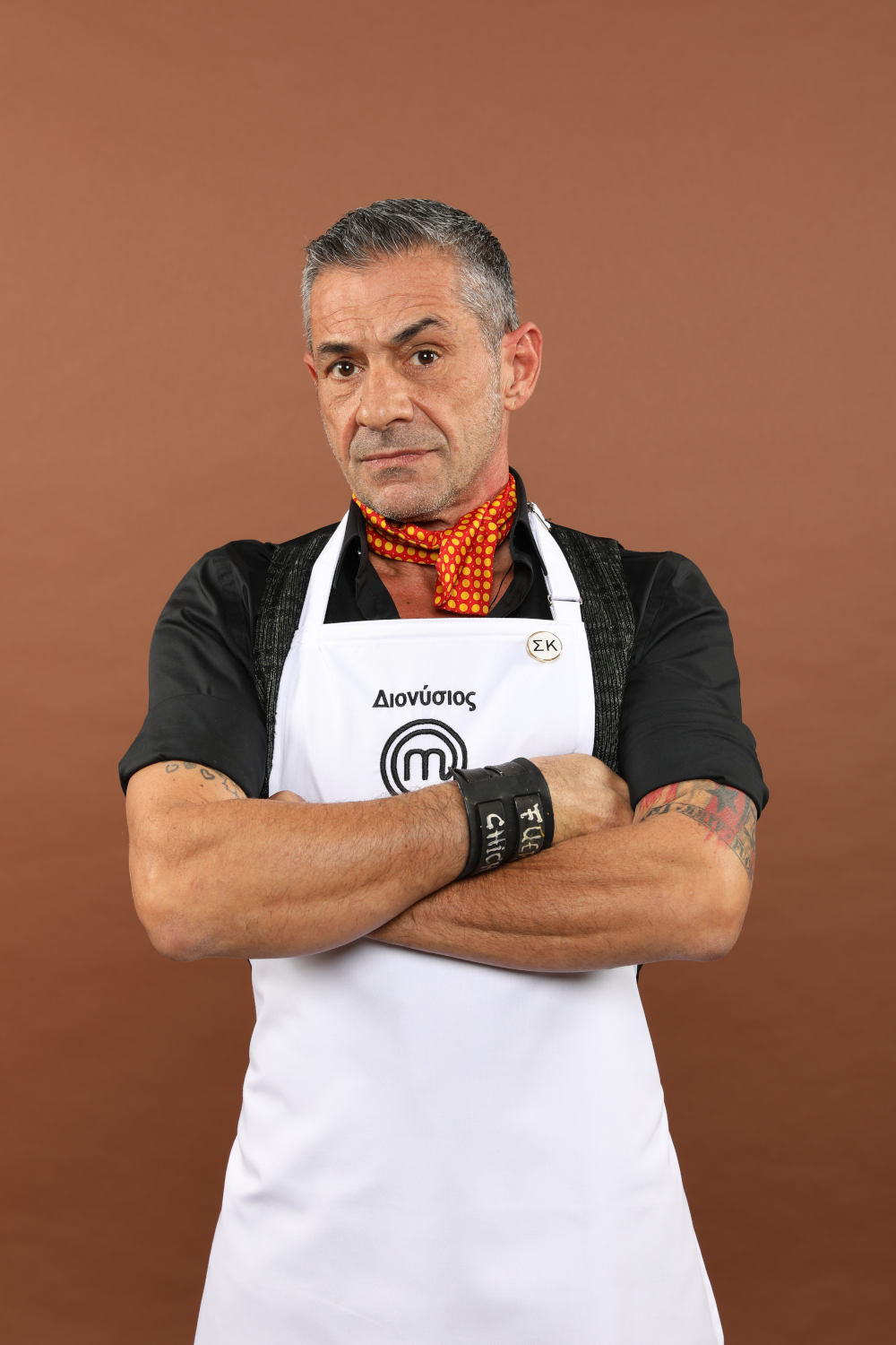 Ο Διονύσης Πρώιος με ποδιά του MasterChef 4