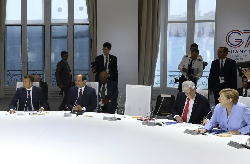 Μακρόν και Μέρκελ σε συνάντηση της G7