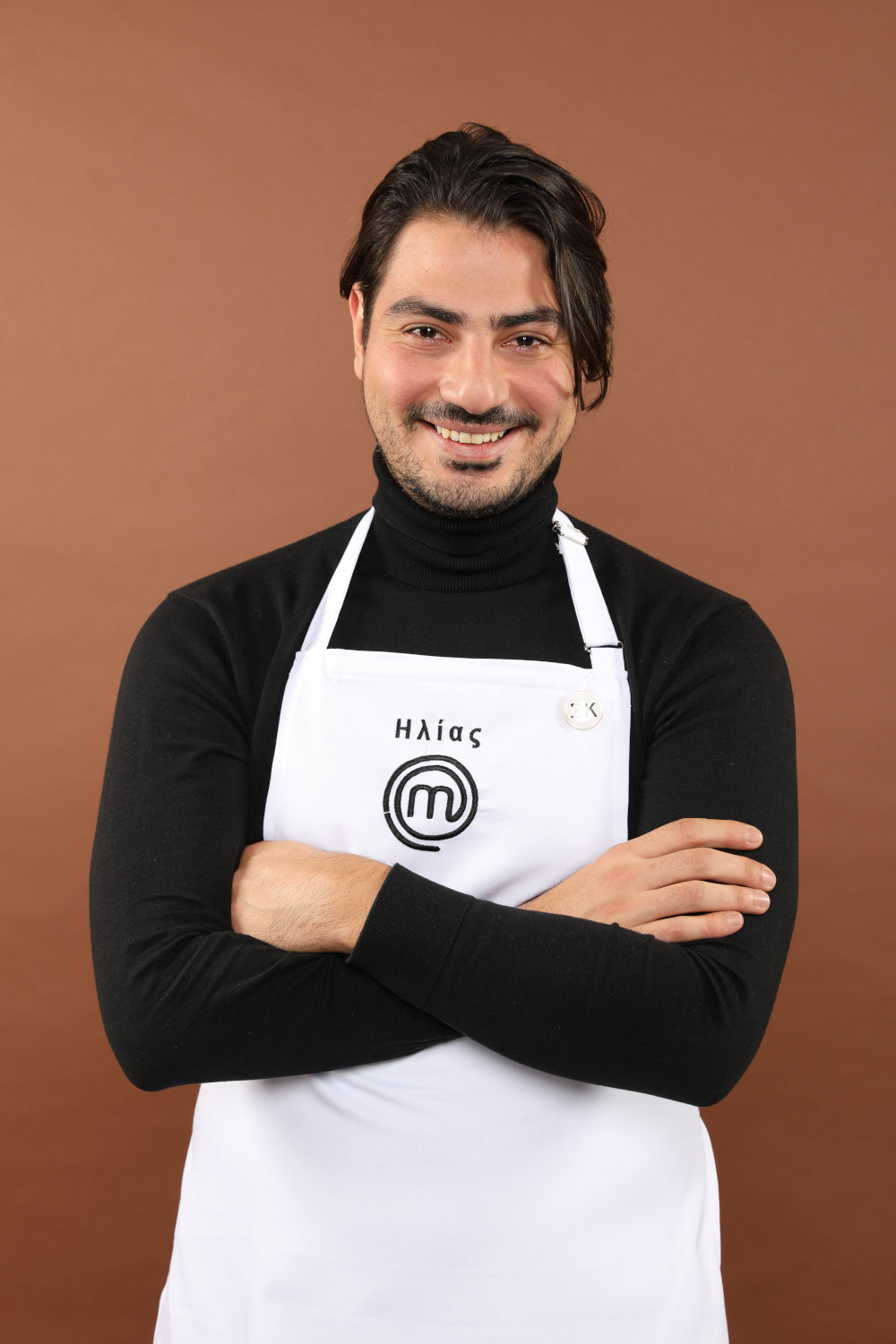 O Ηλίας Ηλιόπουλος με την ποδιά του MasterChef 4