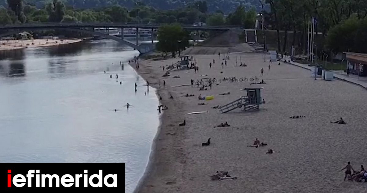 Aνάσα ελευθερίας στο Κίεβο: Ουκρανοί συρρέουν στις όχθες του Δνείπερου για μπάνιο και ηλιοθεραπεία [βίντεο]