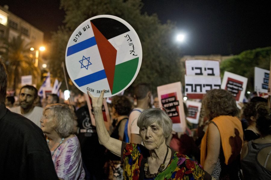 Ισραήλ: Χιλιάδες Ισραηλινοί διαδήλωσαν υπέρ της ειρήνης με τους Παλαιστινίους [εικόνες] | iefimerida.gr 1