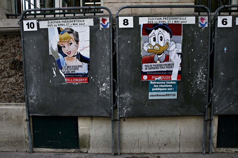 Το Παρίσι σε ρυθμούς εκλογών: Από πόλη του Φωτός έγινε πόλη της... αφίσας [εικόνες]  | iefimerida.gr 6