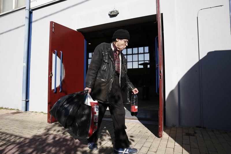 Ενα χαμόγελο, μία ευχή και ζεστό φαγητό για όλους -Στο χριστουγεννιάτικο γεύμα αλληλεγγύης για τους άστεγους [εικόνες] | iefimerida.gr 1