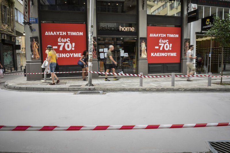 Ασφαλτόστρωση της οδού Βορέου με coolseal -Φωτογραφίες: EUROKINISSI/ΤΑΤΙΑΝΑ ΜΠΟΛΑΡΗ
