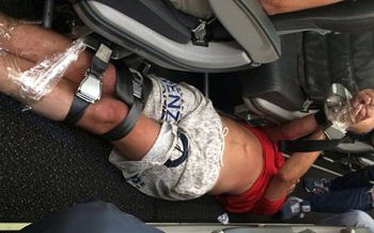 Οργισμένοι επιβάτες έδεσαν μεθυσμένο άντρα με κολλητική ταινία και ζώνες [εικόνες&βίντεο]  | iefimerida.gr 2