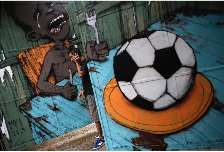 Ο τοίχος είχε τη δική του ιστορία -Τα γκράφιτι της οργής και του θυμού κατά του Μουντιάλ στη Βραζιλία [εικόνες] | iefimerida.gr 3