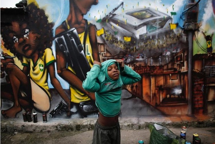 Ο τοίχος είχε τη δική του ιστορία -Τα γκράφιτι της οργής και του θυμού κατά του Μουντιάλ στη Βραζιλία [εικόνες] | iefimerida.gr 4