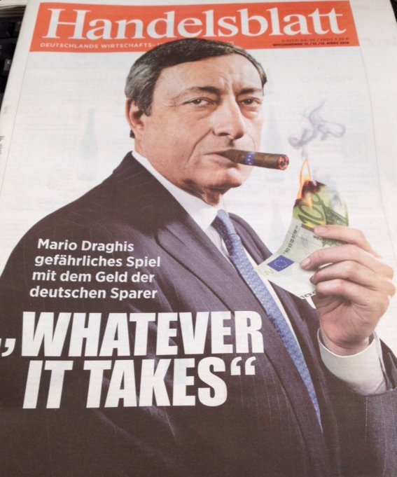 Eξώφυλλο Handelsblatt: Ο Μάριο Ντράγκι ανάβει το πούρο του με χαρτονόμισμα των 100 ευρώ [εικόνα] | iefimerida.gr 0