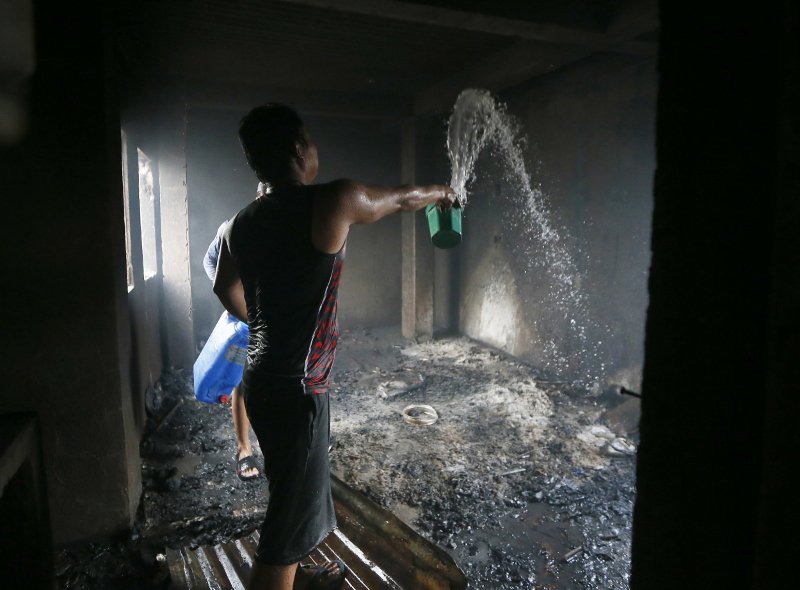 Πύρινη λαίλαπα  αποτέφρωσε τα σπίτια 15.000 κατοίκων παραγκούπολης στη Μανίλα [εικόνες]  | iefimerida.gr 1