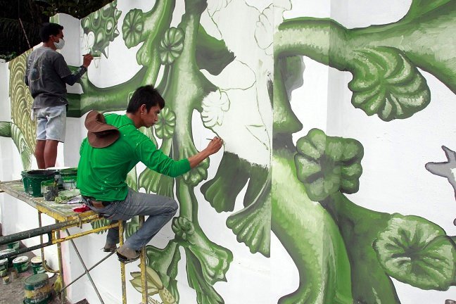 Φιλιππίνες: Μια μπογιά που «τρώει» τη ρύπανση σώζει την πρωτεύουσα [εικόνες] | iefimerida.gr 0