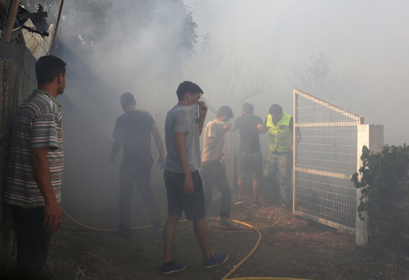 Σε πύρινο κλοιό 2.000 κάτοικοι κωμόπολης στην κεντρική Πορτογαλία [εικόνες & βίντεο]  | iefimerida.gr 4