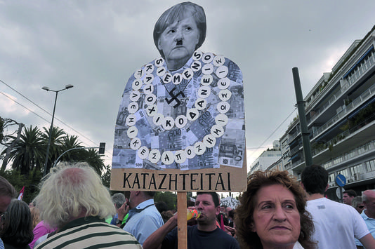 Le Monde: Ελληνες και Γερμανοί σφάζονται μέσα από σκίτσα [εικόνες] | iefimerida.gr 1