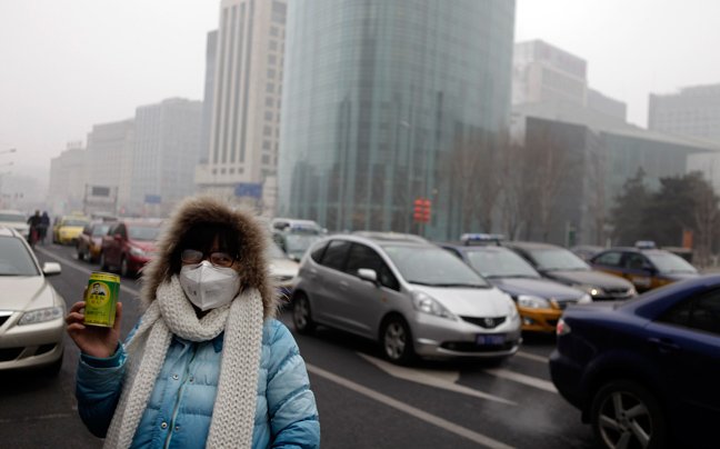 Πυκνή αιθαλομίχλη πνίγει το Πεκίνο - Με μάσκες κυκλοφορούν οι κινέζοι [εικόνες] | iefimerida.gr 0