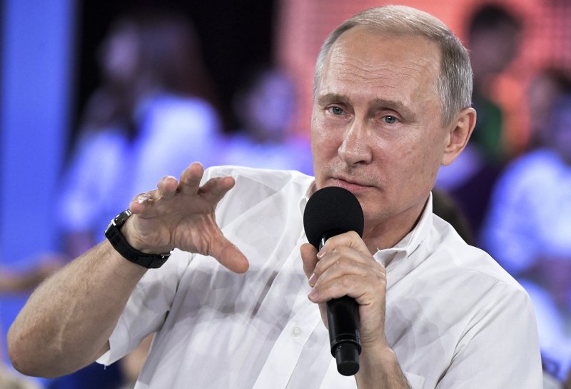 Ο Πούτιν χαλάρωσε για να κερδίσει τους νέους -Με ανοιχτό πουκάμισο, χωρίς σακάκι, απάντησε σε ερωτήσεις παιδιών [εικόνες] | iefimerida.gr 0