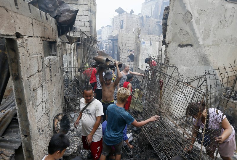 Πύρινη λαίλαπα  αποτέφρωσε τα σπίτια 15.000 κατοίκων παραγκούπολης στη Μανίλα [εικόνες]  | iefimerida.gr 5