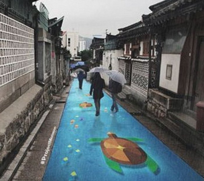 Εκπληκτικά έργα στους δρόμους της Σεούλ -Εμφανίζονται μόνο όταν βρέχει [εικόνες] | iefimerida.gr 3