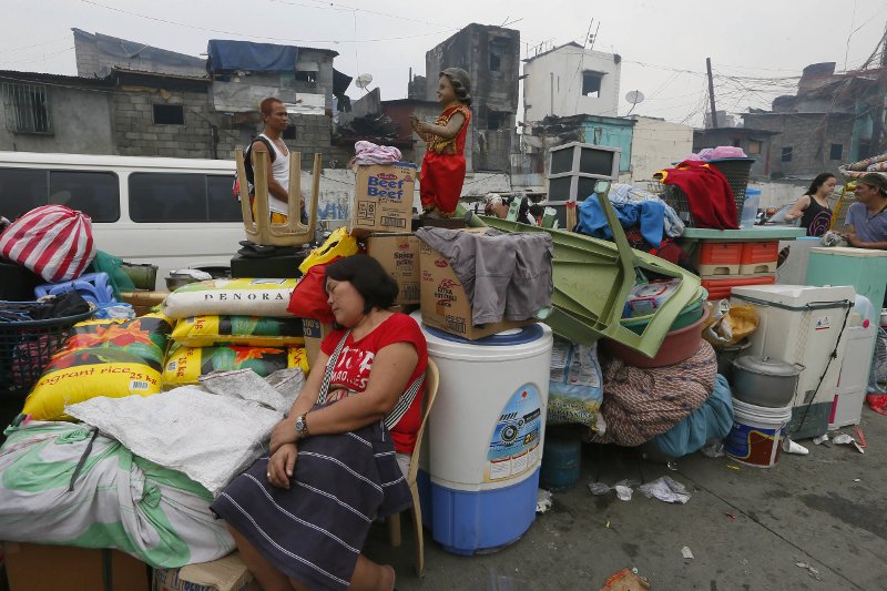 Πύρινη λαίλαπα  αποτέφρωσε τα σπίτια 15.000 κατοίκων παραγκούπολης στη Μανίλα [εικόνες]  | iefimerida.gr 6