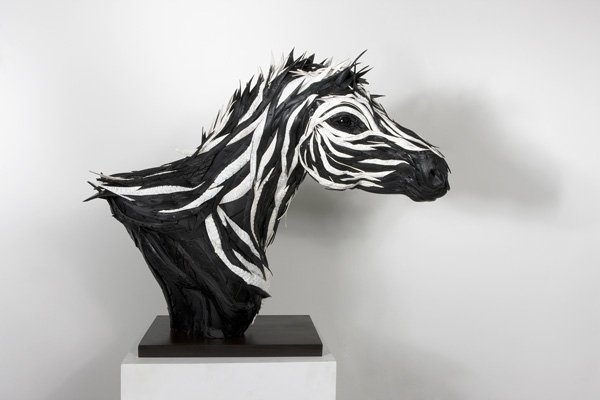 Ελαστικά έργα τέχνης - Εντυπωσιακά γλυπτά από ρόδες αυτοκινήτων [εικόνες] | iefimerida.gr 7