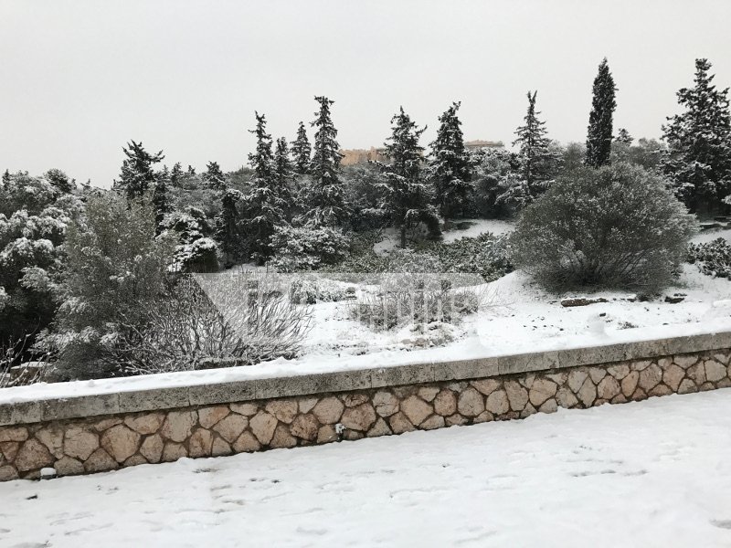 Μοναδικές εικόνες: Η χιονισμένη Ακρόπολη, η κατάλευκη Διονυσίου Αρεοπαγίτου [εικόνες] | iefimerida.gr 12