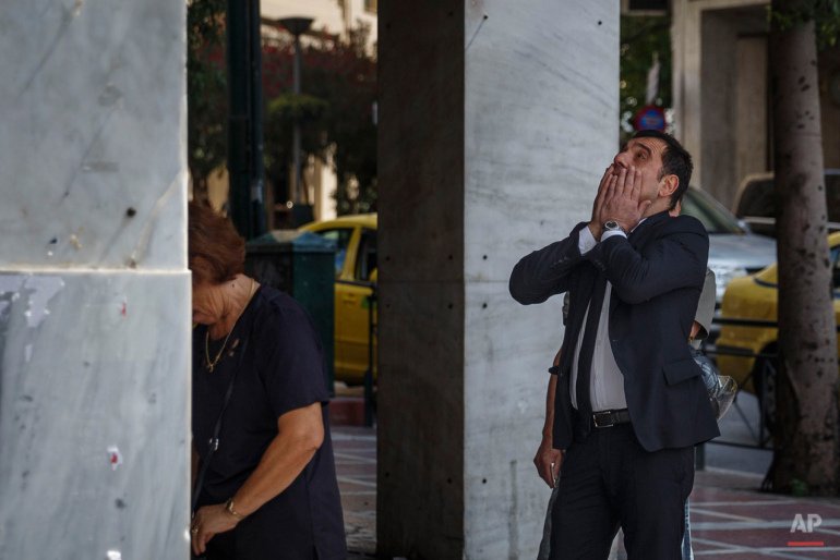 Το δημοψήφισμα, οι κλειστές τράπεζες, τα capital controls -Ολα μέσα από τον φακό του Associated Press [εικόνες] | iefimerida.gr 4
