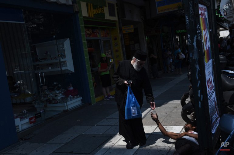 Το δημοψήφισμα, οι κλειστές τράπεζες, τα capital controls -Ολα μέσα από τον φακό του Associated Press [εικόνες] | iefimerida.gr 9