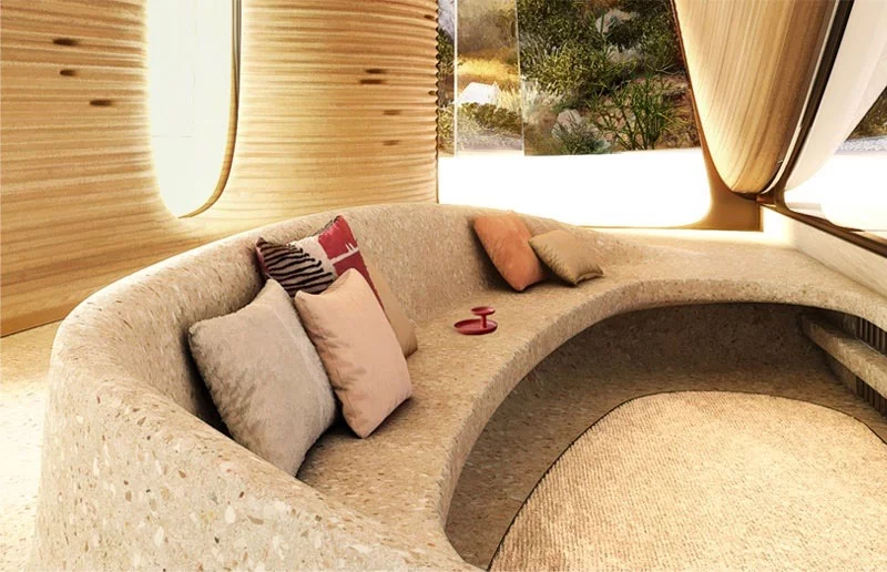 ο καναπές είναι κατασκευασμένος από το ίδιο τσιμεντένιο μωσαϊκό με το πάτωμα. 