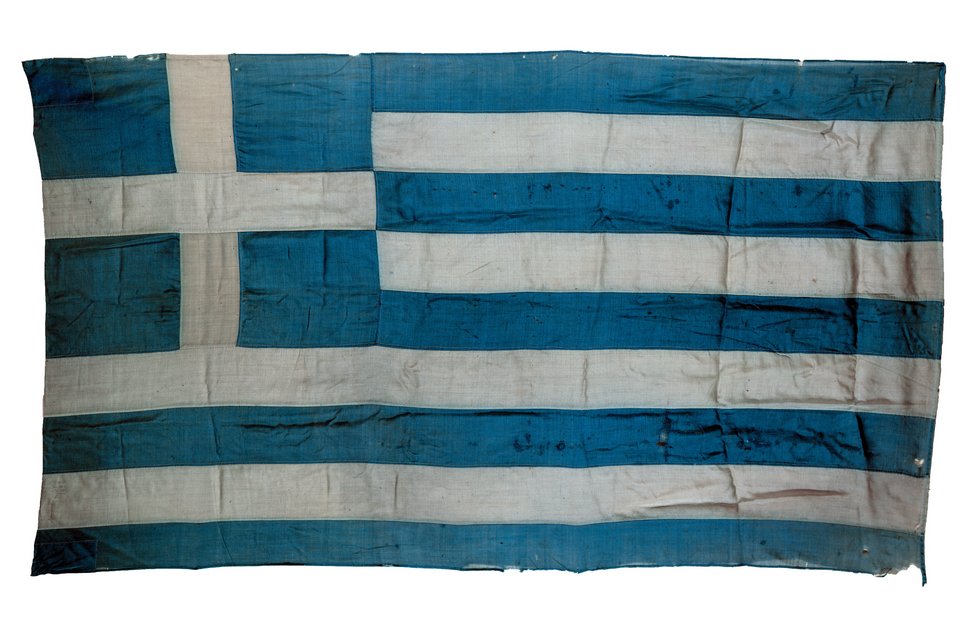 Σημαία από το Δημαρχείο Μυριοφύτου ΑνατολικήςΘράκης, η οποία διασώθηκε από τον δήμαρχο τηςπόλης Γεώργιο Καρά. Συλλογή Εθνικού Ιστορικού