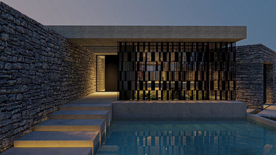 Ένα πέτρινο μονοπάτι δίπλα στην πισίνα οδηγεί στην εντυπωσιακή πολυτελή είσοδο της κατοικίας.