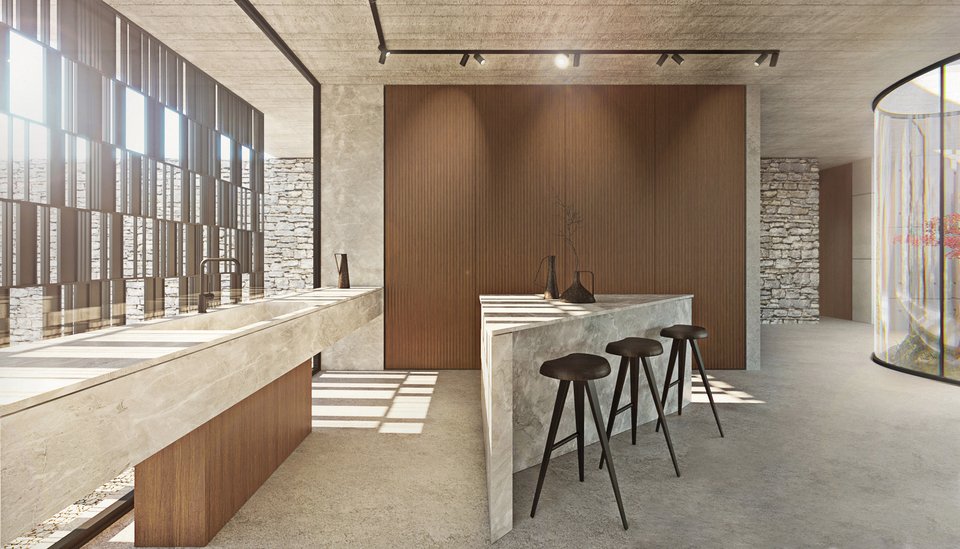 Η μίνιμαλ εντυπωσιακή κουζίνα με την τριγωνική νησίδα.