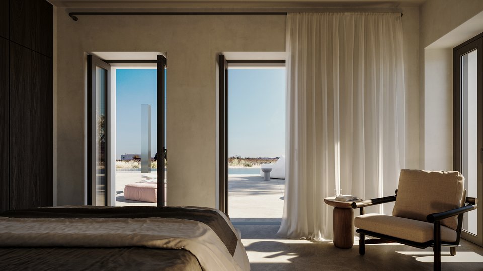 Η θέα του υπνοδωματίου στον χώρο της πισίνας