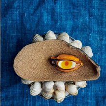 Άποψη του εστιατορίου Noma στην Κοπεγχάγη και ένα από τα πιάτα του