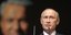 O Πούτιν με φόντο την εικόνα του Μπόρις Γιέλτσιν/Φωτογραφία: ΑΡ