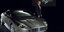 Ο Ντάνιελ Κρεγκ με την Aston Martin που οδηγούσε στο Casino Royale/ Φωτογραφία: ΑΠΕ/  EPA