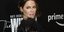H ηθοποιός Κέιτ Μπέκινσεϊλ φορώντας μαύρη τουαλέτα