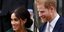 Η Μέγκαν Μαρκλ και ο πρίγκιπας Χάρι χαμογελούν στους φωτογράφους