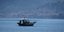 Ενας ψαράς με τη βάρκα του/Φωτογραφία: Eurokinissi