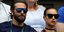 Ο Μπράντλεϊ Κούπερ και η Ιρίνα Σάικ φορούν γυαλιά ηλίου και παρακολουθούν αγώνα