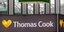 Πινακίδα Thomas Cook και πινακίδα εξόδου