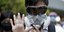 Διαδηλωτής με μάσκα στο Χονγκ Κονγκ