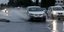 Αυτοκίνητο κινείται σε δρόμο - ποτάμι από την βροχή στην Αθήνα