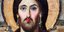 Αφίσα με τον Ιησού μακιγιαρισμένο