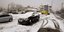Χιόνια σε δρόμο και αυτοκίνητο